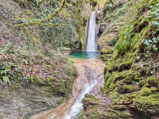 The beautiful waterfall of Galantina River close to Pozze del Diavolo, Italy