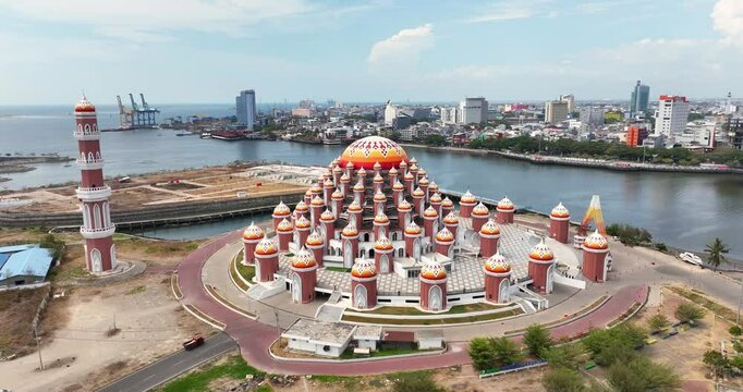 Aerial view & drone shot of a large beautiful mosque / Masjid Kubah 99 Asmaul Husna / September 2024: Makassar - Sulawesi - Indonesia / 4K, UHD