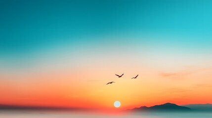 Obraz premium Dreamy sunset sky fading into a deep serene blue gradient with silhouetted birds soaring against the ethereal atmospheric landscape This captivating minimalist scene evokes a sense of tranquility