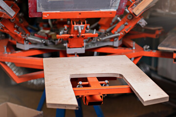 silk screen textile printery. manual screen printing. shelve of the print screening apparatus for printing on pants