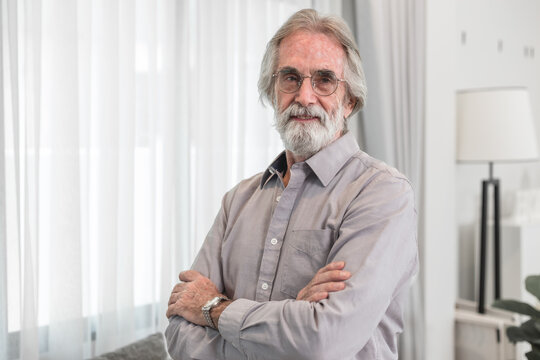 Friendly 75-Year-Old Gray-Haired Western Man Standing and Smiling with a Healthy, Balanced Mindset and a Warm, Positive Expression