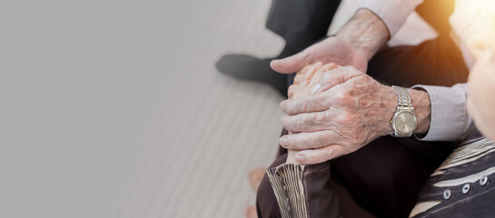 75-Year-Old Western Man with Gray Hair Hugging an Elderly Woman, Offering Comfort and Support. Senior Couple, Friends, or Siblings Sharing an Emotional Moment