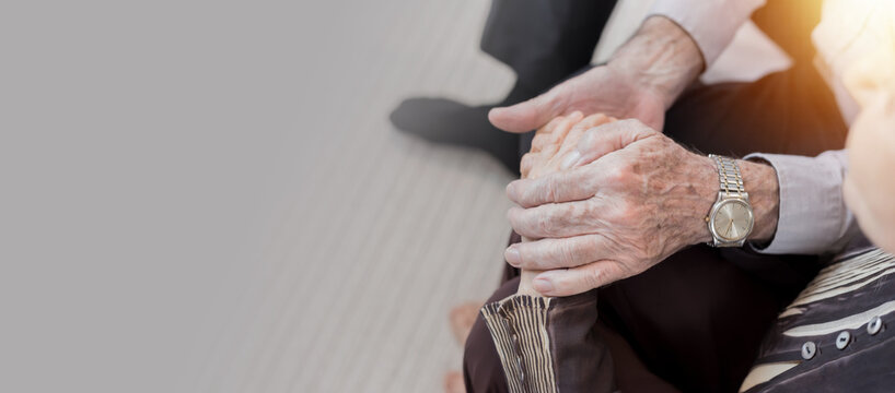 75-Year-Old Western Man with Gray Hair Hugging an Elderly Woman, Offering Comfort and Support. Senior Couple, Friends, or Siblings Sharing an Emotional Moment