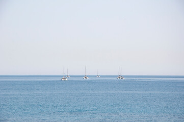 Catamaran sailing in sea. Luxury catamaran yacht aerial view. Summer vacation. Luxury travel lifestyle. Vacation on summer. Aerial catamaran at sea. Sea travel