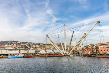 Naklejka premium Porto Antico in Genova Italy with beautiful blue clouds in the background.