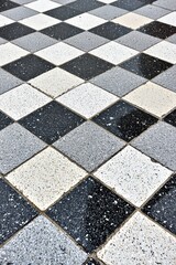 Black and White Checkerboard Pattern on Ground with Textured Surface for Creative Design and Background Use