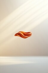 Fototapeta premium Fluid orange shape floats gracefully, illuminated by soft, natur