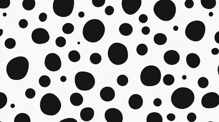 Black and white polka dot pattern with various sized circles on white background