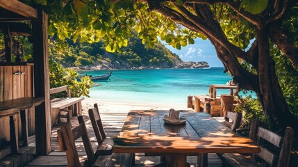 Fototapeta premium Sunlit wooden table under hanging tropical foliage, with a breathtaking view of crystal-clear ocean waters