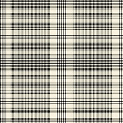 Classic black and white plaid pattern perfect for textiles and backgrounds.