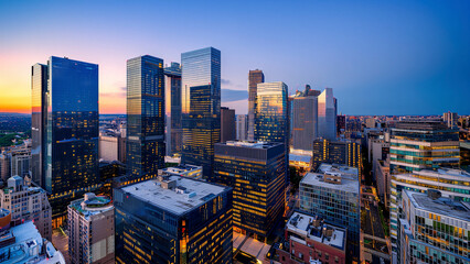 Drone view of the city's financial district skyline at dawn