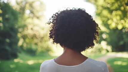 Hair restoration experience portrayed in a tranquil park setting. Featuring nature and self-care