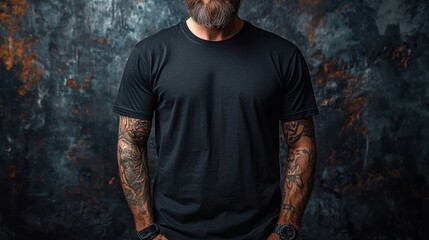 Studio Shot of a Bearded Man with Tattoos Wearing a Black T-Shirt