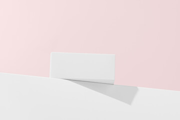 White mockup blank box on pedestal on pink isolated background. Concept of packaging design and advertising or presentation of new product. Template for your design