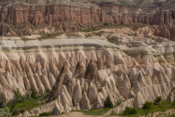 Cappadocia’s colorful rock formations, shaped by wind and water erosion, create a surreal landscape. Layers of volcanic rock reveal history, while valleys and cliffs form an awe-inspiring natural wond