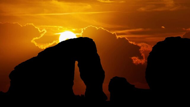 Elephant rock erosion monolit in Al-Ula, Saudi Arabia, Time Lapse at Sunset with Red Sun and Fiery Sky