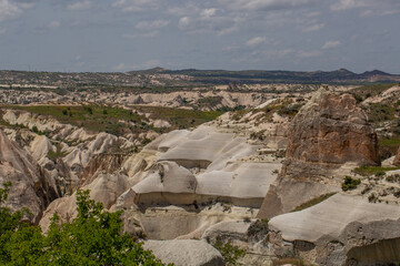 Cappadocia’s colorful rock formations, shaped by wind and water erosion, create a surreal landscape. Layers of volcanic rock reveal history, while valleys and cliffs form an awe-inspiring natural wond