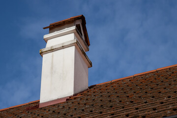 Roof and a chimney, Holasovice, Czechia
