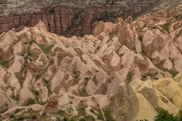 Cappadocia’s colorful rock formations, shaped by wind and water erosion, create a surreal landscape. Layers of volcanic rock reveal history, while valleys and cliffs form an awe-inspiring natural wond