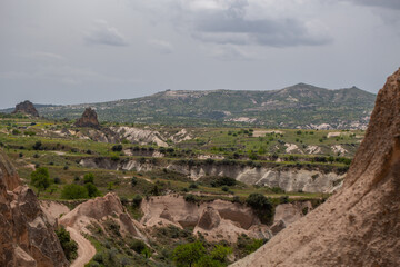 Cappadocia’s colorful rock formations, shaped by wind and water erosion, create a surreal landscape. Layers of volcanic rock reveal history, while valleys and cliffs form an awe-inspiring natural wond