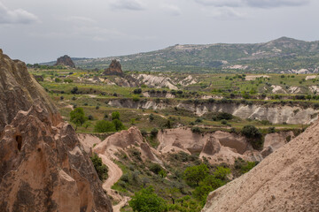Cappadocia’s colorful rock formations, shaped by wind and water erosion, create a surreal landscape. Layers of volcanic rock reveal history, while valleys and cliffs form an awe-inspiring natural wond
