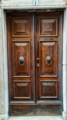 Old vintage brown door on the street