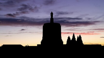 Salem Oregon Government Capital Building Downtown, Time Lapse at Twilight with Colourful Sky and Dark Silhouette of dome and Pioneer, USA