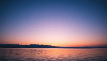 Calm Sunset Over Water, Blue, Purple and Pink Sky, Evening Landscape Horizon, Photograph.