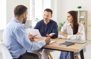 Business talk, solicitor discussing insurance document, contract showing, sale, purchase, rent or...