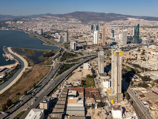 Obraz premium Izmir Skyline Expanding with Modern Skyscrapers Under Construction, Showing Urban Development in Turkey
