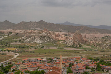 Cappadocia’s colorful rock formations, shaped by wind and water erosion, create a surreal landscape. Layers of volcanic rock reveal history, while valleys and cliffs form an awe-inspiring natural wond