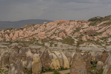 Cappadocia’s colorful rock formations, shaped by wind and water erosion, create a surreal landscape. Layers of volcanic rock reveal history, while valleys and cliffs form an awe-inspiring natural wond