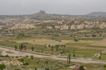 Cappadocia’s colorful rock formations, shaped by wind and water erosion, create a surreal landscape. Layers of volcanic rock reveal history, while valleys and cliffs form an awe-inspiring natural wond