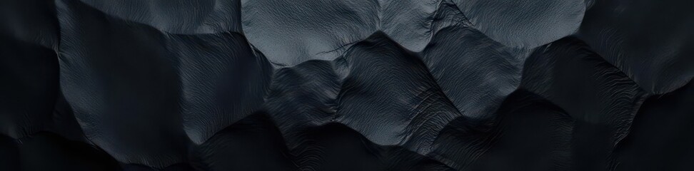 Obraz premium Deep, glossy black plastic surface with subtle sheen, rough, smooth, coal
