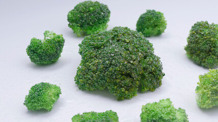 broccoli on a white plate fresh vegetables for vegan and healthy