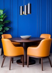 Fototapeta premium Round dark brown wooden table with four mustard yellow leather chairs in a room with a deep blue wall and modern pendant lights