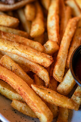 A close-up image of crispy golden French fries, showcasing their texture and inviting flavor
