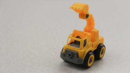 Fototapeta premium Big charger on a dark background. Industrial concept, using loaders, bulldozers for industrial work.