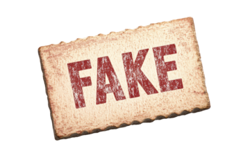 Isolated Rustic Wooden Label with the Word 'FAKE' Engraved