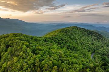 Fototapeta premium Bright sunrise in North Carolina Appalachian mountains in summer season. Summertime landscape of beautiful nature