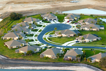 Cul de sac street dead end and private residential houses in rural suburban sprawl area in North...