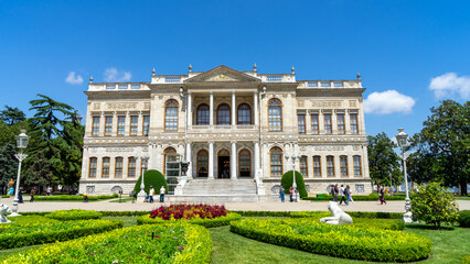 Naklejka premium Dolmabahсe Palace in Istanbul, Turkey, on European coast of Bosporus strait, main administrative center of Ottoman Empire in Turkiye