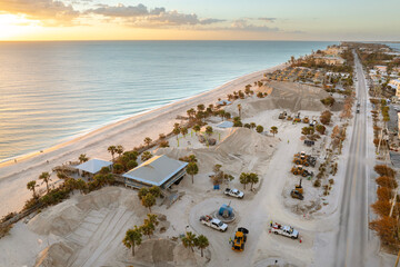 Sand recipient site for residents to dump sand after hurricane Milton storm surge. Huge sand piles...