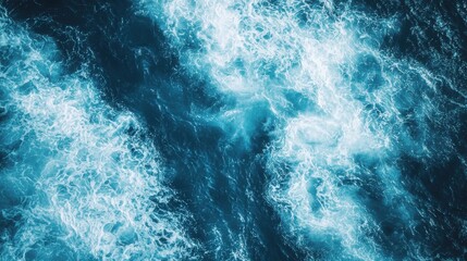 Obraz premium Turbulent Ocean Waves in Deep Blue Tone Captured from Above
