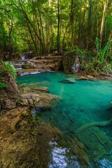 Fototapeta premium Tropical Waterfall and Turquoise Pool