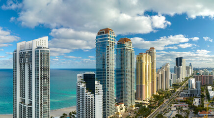 View from above of luxurious highrise hotels and condos on Atlantic ocean shore in Sunny Isles...