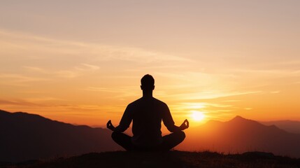 A silhouette meditating on a mountain at sunset, embodying tranquility and connection with nature.