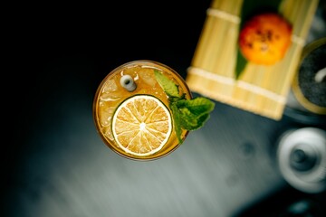 Glass of lemonade with lemon slice
