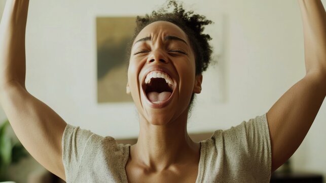 A woman celebrating her lottery win with a big smile in a minimalist living room. Featuring excitement and disbelief