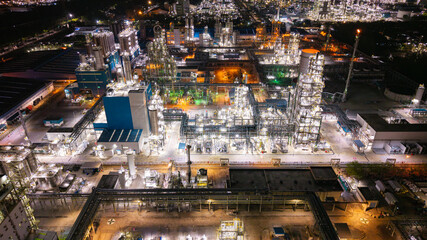 Illuminated Industrial Refinery at Night